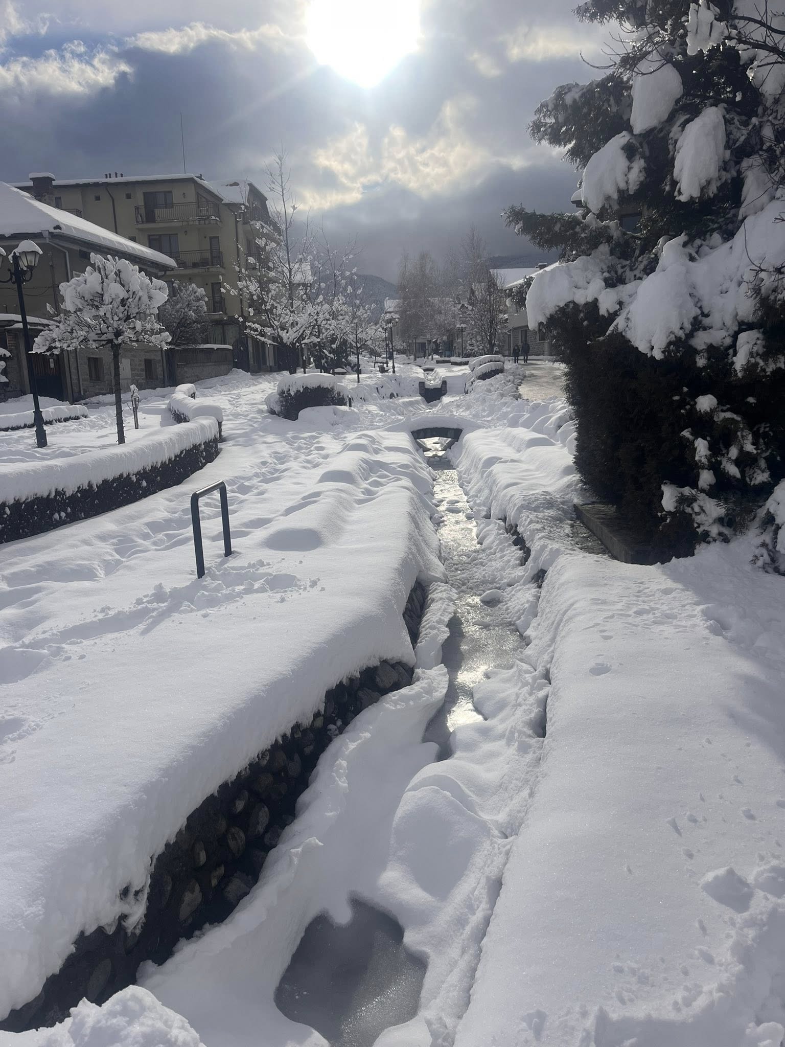 photo of snow on Gotse Delchev Street in Bansko town, Bulgaria